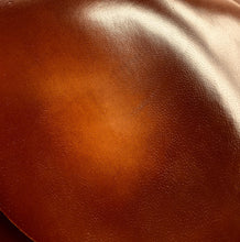 Load image into Gallery viewer, A Beautiful Classic Brush Off Goat, that once brushed off - either buy hand or on a wheel - gives an expensive, cordovan like appearance to any end product. The Tan colour has a lighter shade underneath that shows through when brushed off, whilst the black develops a brilliant, aniline shine. Brush off wherever the natural accents of your finished product are or wherver you would like the base colour to show through, to create truly one of a kind pieces.