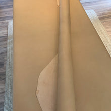Load image into Gallery viewer, This beautiful, 100% veg-tanned calf leather is perfect for hand tooling, hand staining, and burnishing. Due to the high veg content it has a very good cut edge, and semi-firm handle. There is no finish on this leather at all, just a beautiful natural calf leather that will polish and burnish beautifully. Available in whole skins or sides.