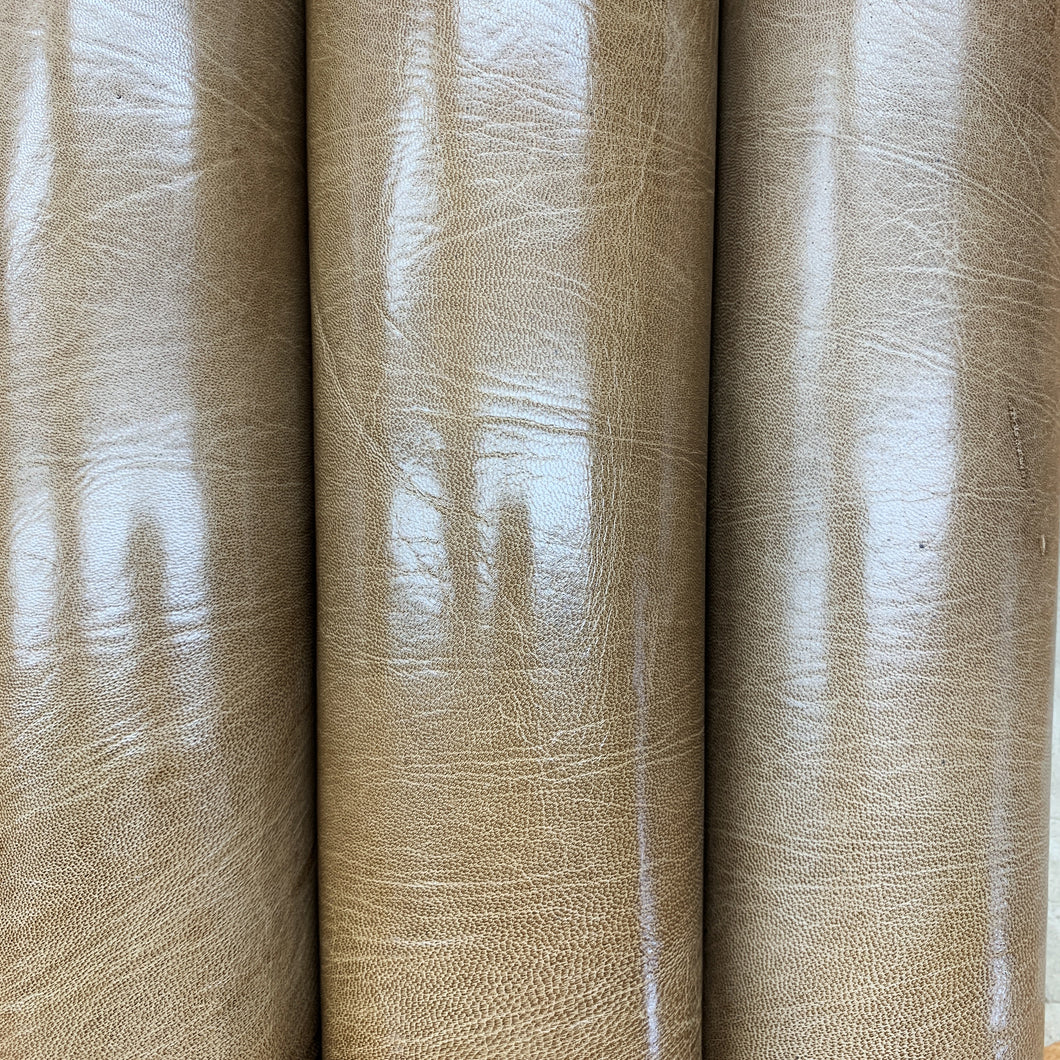 smooth, aniline glazed kid leather.