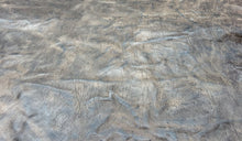 Load image into Gallery viewer, A unique African goat, that&#39;s been scrunched, hand washed, tipped and polished,  They have been infused with our unique blend of oils and waxes, to give the leather it&#39;s burnishable and polishable attributes.  As each skin is produced by hand, they&#39;re all one of a kind.
