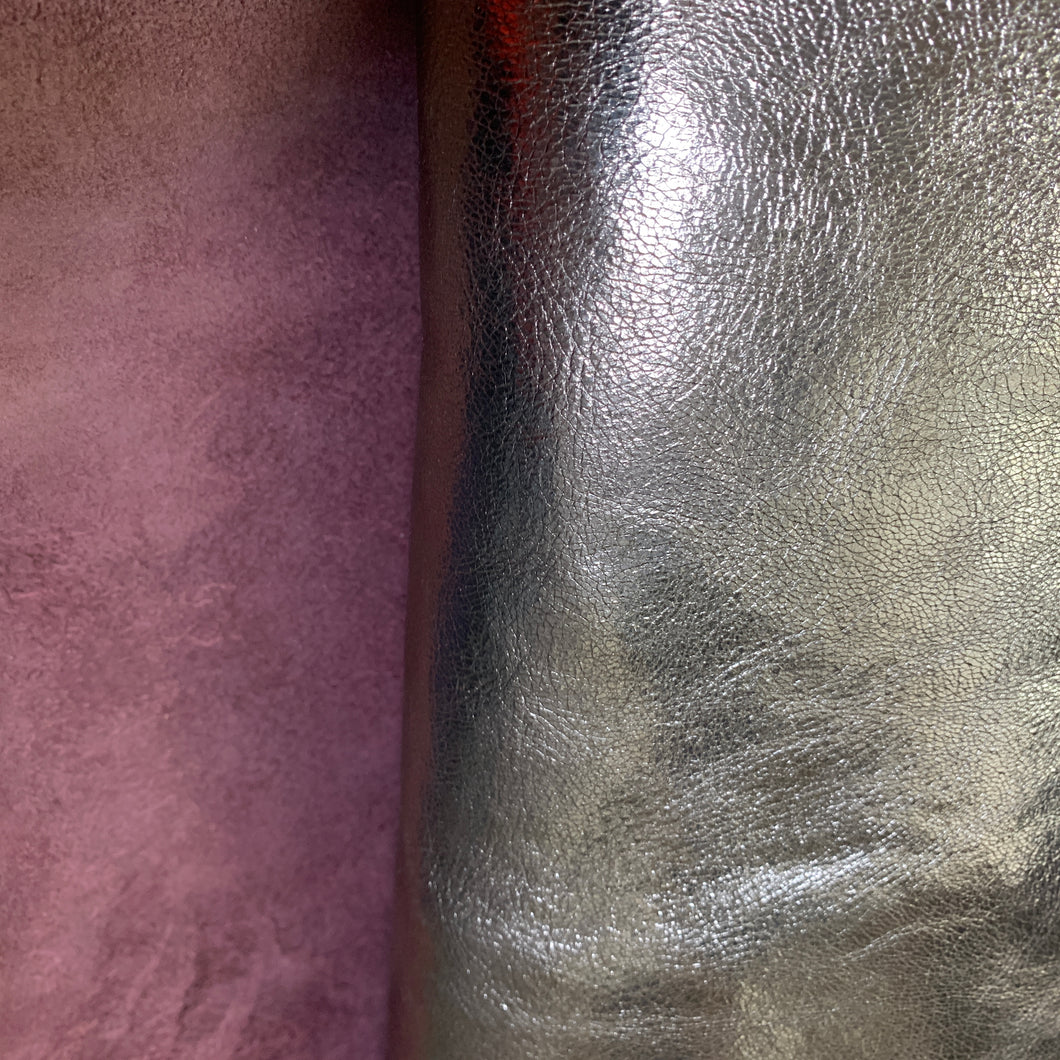 Nigerian Goat with a Titanium Metallic foil grain, and a oxblood back.