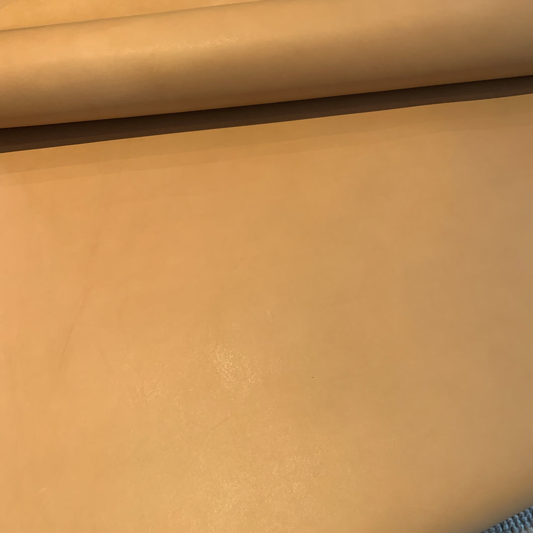 This beautiful, 100% veg-tanned calf leather is perfect for hand tooling, hand staining, and burnishing. Due to the high veg content it has a very good cut edge, and semi-firm handle.  There is no finish on this leather at all, just a beautiful natural calf leather that will polish and burnish beautifully.  Available in whole skins or sides.