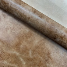 Load image into Gallery viewer, This two-tone, pull up effect Goat nubuck has a subtle crackled effect to the grain and is perfect for use in small leather goods, footwear and any other leather crafts.
